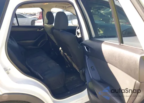 2015 Mazda Cx-5 Touring z USA, uszkodzony, nr VIN JM3KE2CY0F0497736